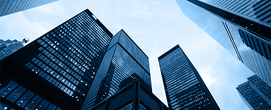 Modern commercial towers rising into the sky